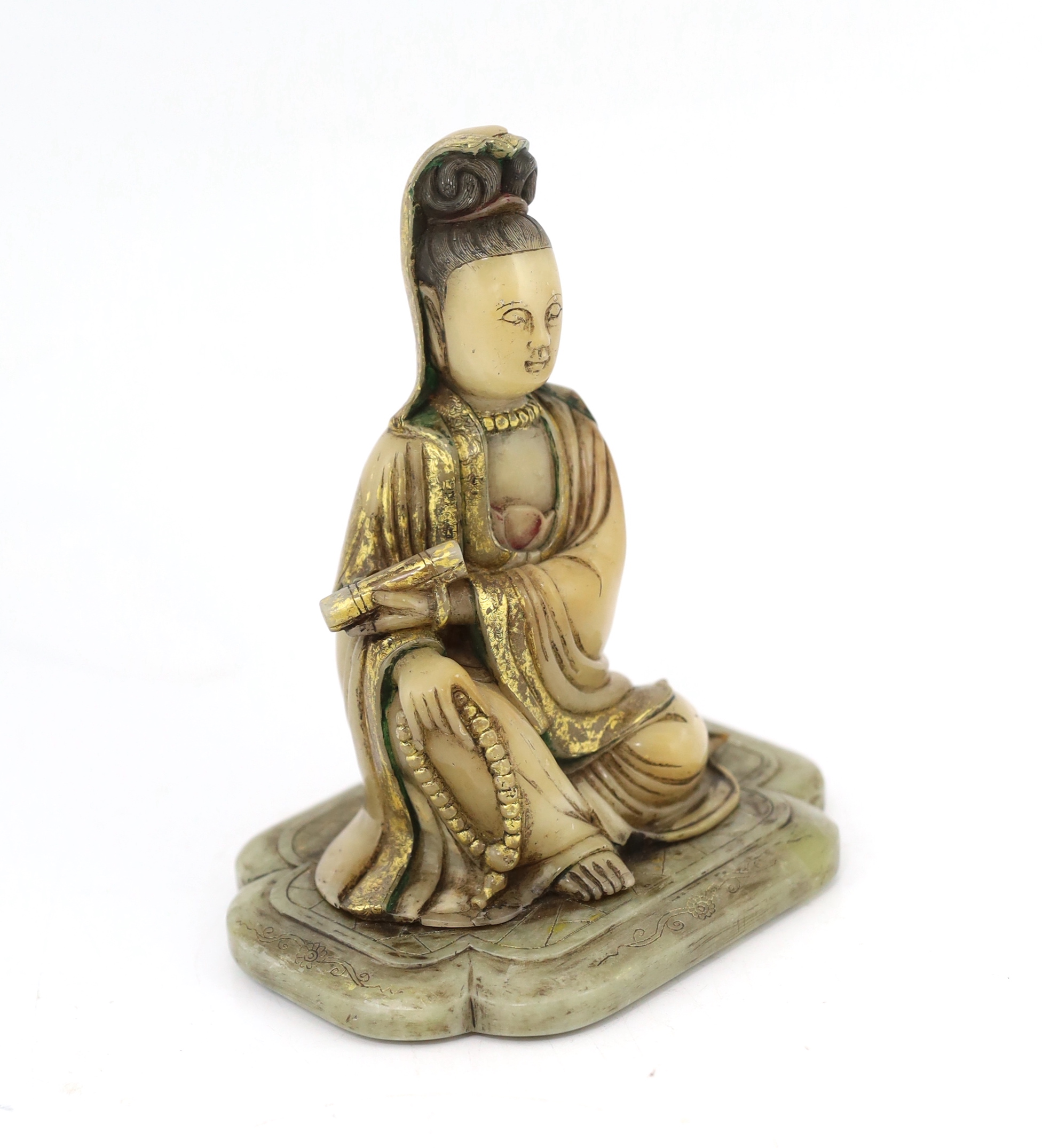 A Chinese soapstone seated figure of Guanyin, 17th/18th century